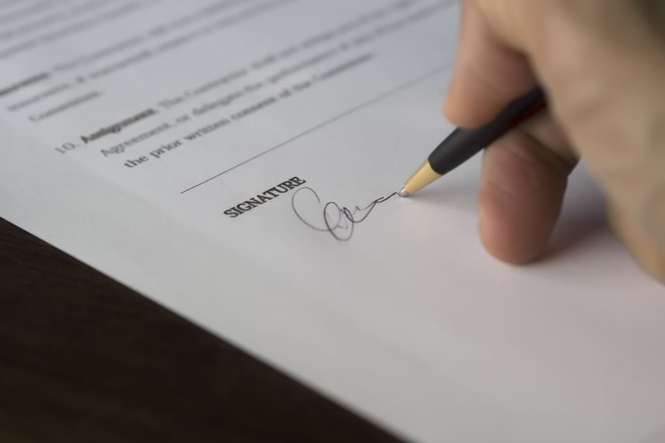 Provider credentialing application and payer contract being completed
